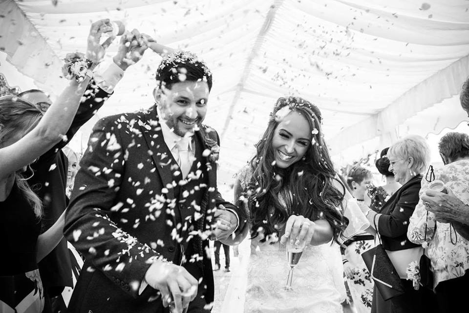Natural wedding confetti moment 